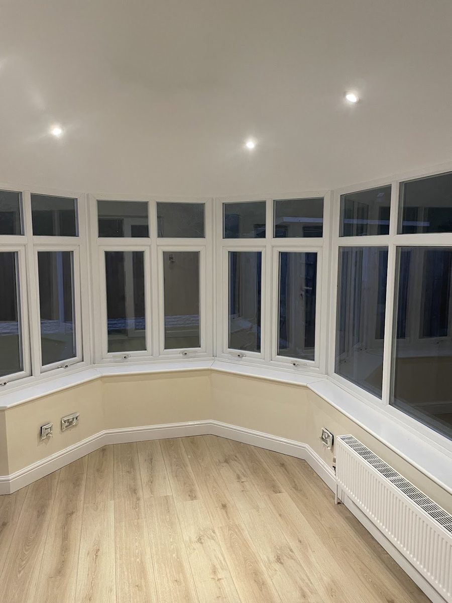 Bright finished room with spotlights