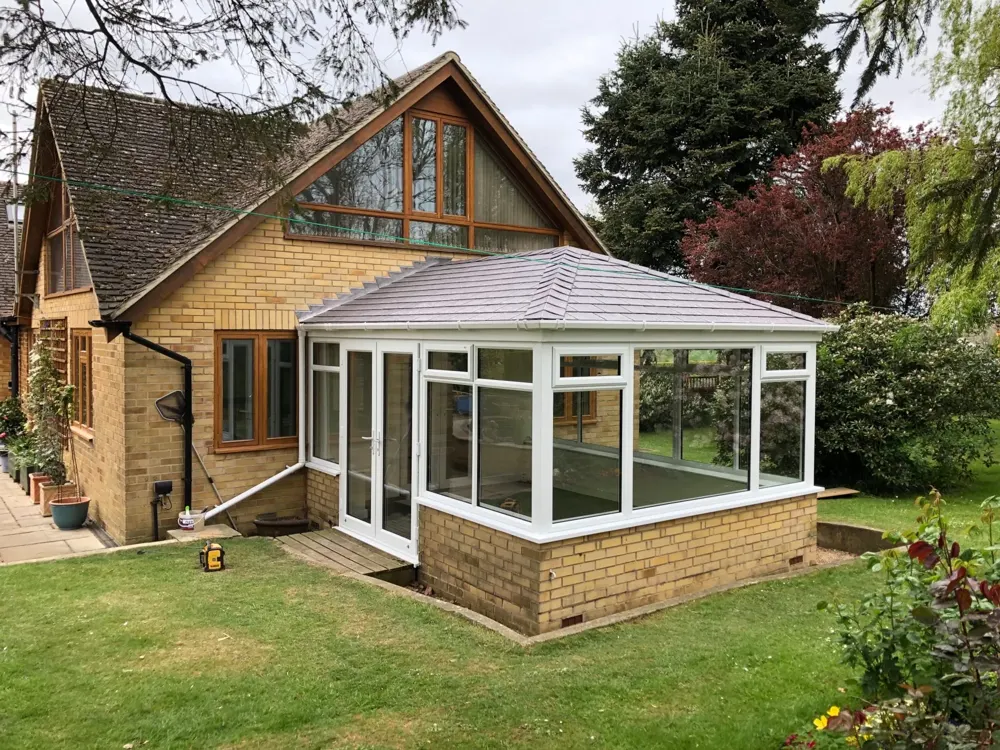 Edwardian conservatory with a tiled roof fitted by Nu-Look
